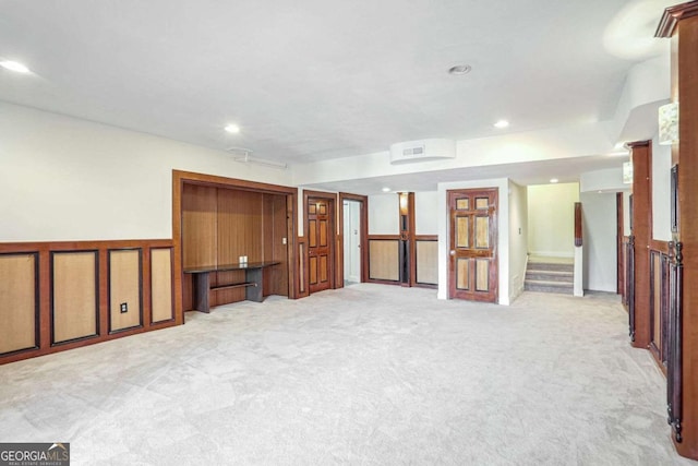 empty room with light colored carpet