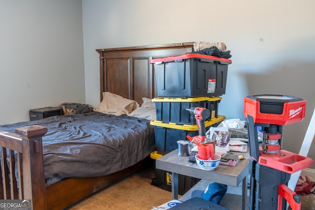 bedroom featuring carpet