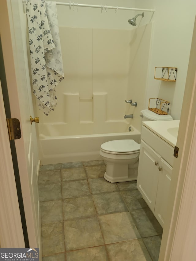 full bathroom featuring shower / tub combination, vanity, and toilet