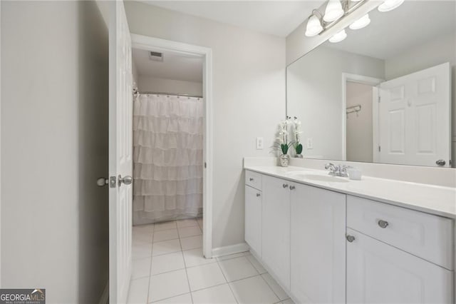 bathroom featuring vanity and tile patterned floors