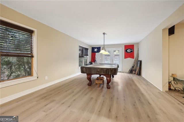 rec room featuring french doors, billiards, and light hardwood / wood-style floors