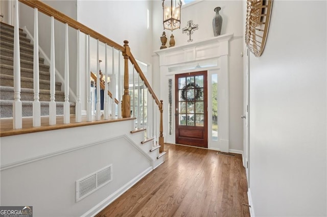 entrance foyer featuring hardwood / wood-style flooring