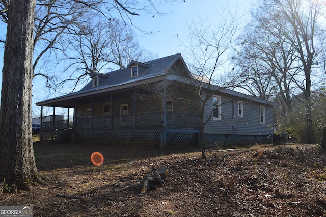 view of home's exterior with a porch