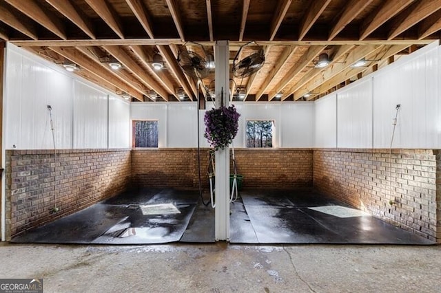 3055 Spring Hill Dr, Monroe, GA 30656 - basement featuring brick wall