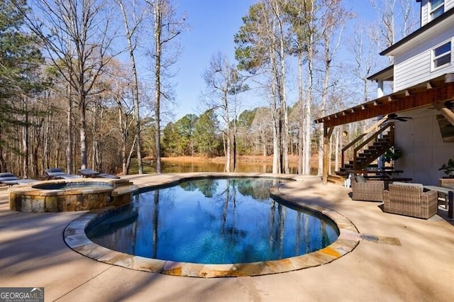 3055 Spring Hill Dr, Monroe, GA 30656 - view of pool featuring stairs, a patio, a pool with connected hot tub, a ceiling fan, and an outdoor hangout area