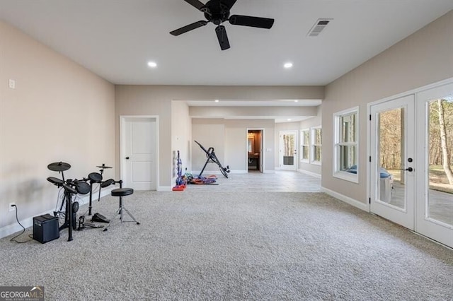 workout room featuring recessed lighting, visible vents, light colored carpet, and french doors