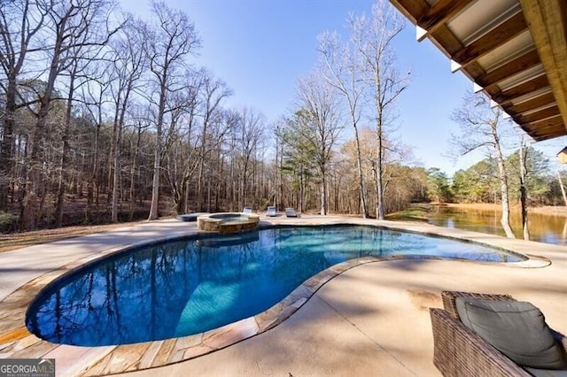 3055 Spring Hill Dr, Monroe, GA 30656 - view of pool featuring a pool with connected hot tub and a patio