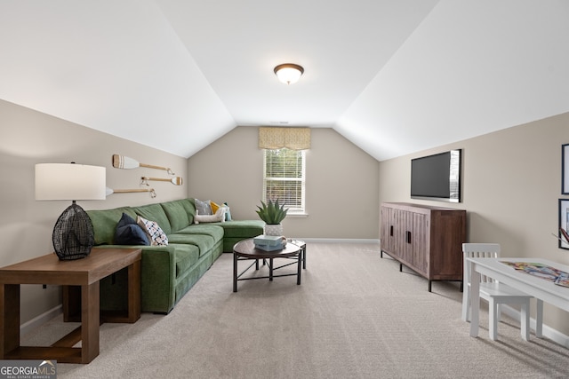 living room featuring vaulted ceiling and light colored carpet