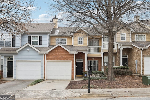 multi unit property featuring a garage