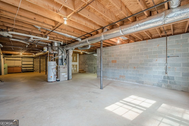 basement featuring gas water heater and heating unit