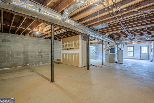 basement featuring gas water heater