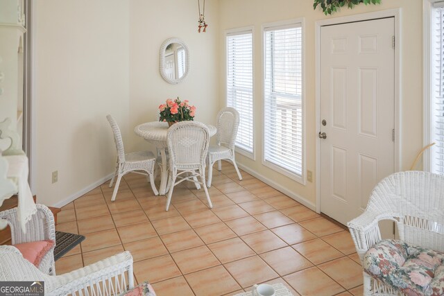 living area featuring light tile patterned floors