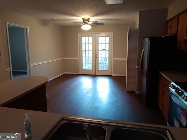 kitchen featuring french doors and ceiling fan