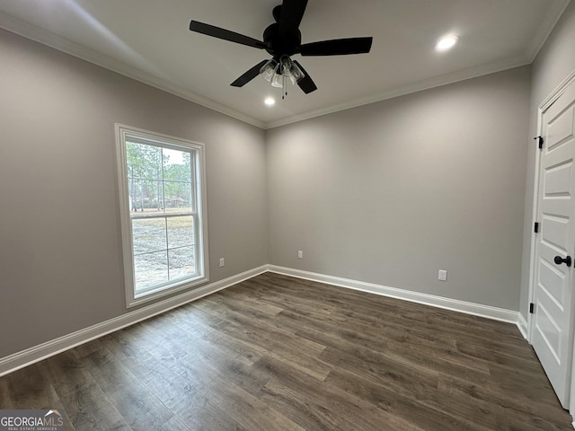 spare room featuring ornamental molding, ceiling fan, and dark hardwood / wood-style flooring