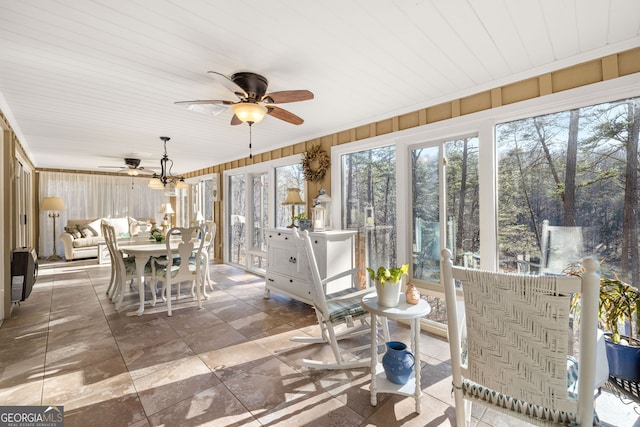 sunroom / solarium with ceiling fan