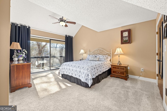 bedroom with lofted ceiling, carpet, access to exterior, and a textured ceiling