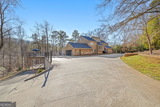 view of property exterior with a garage