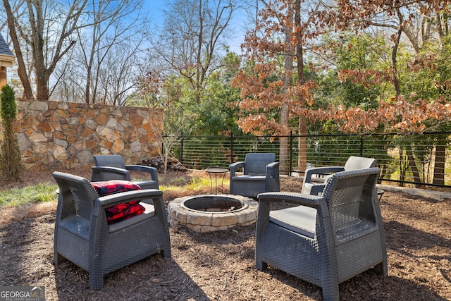 view of yard with a fire pit