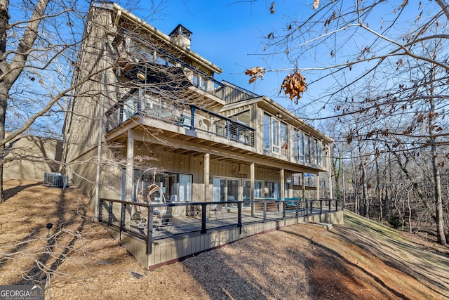 view of front of home featuring central air condition unit