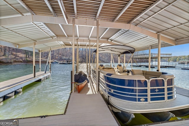 dock area featuring a water view