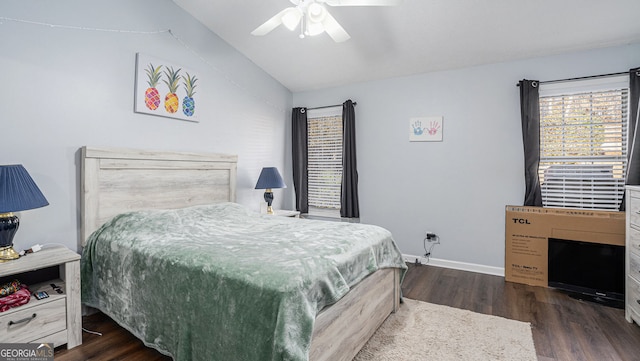 bedroom featuring ceiling fan and dark hardwood / wood-style flooring