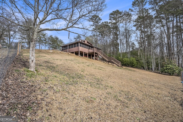 view of yard with a wooden deck