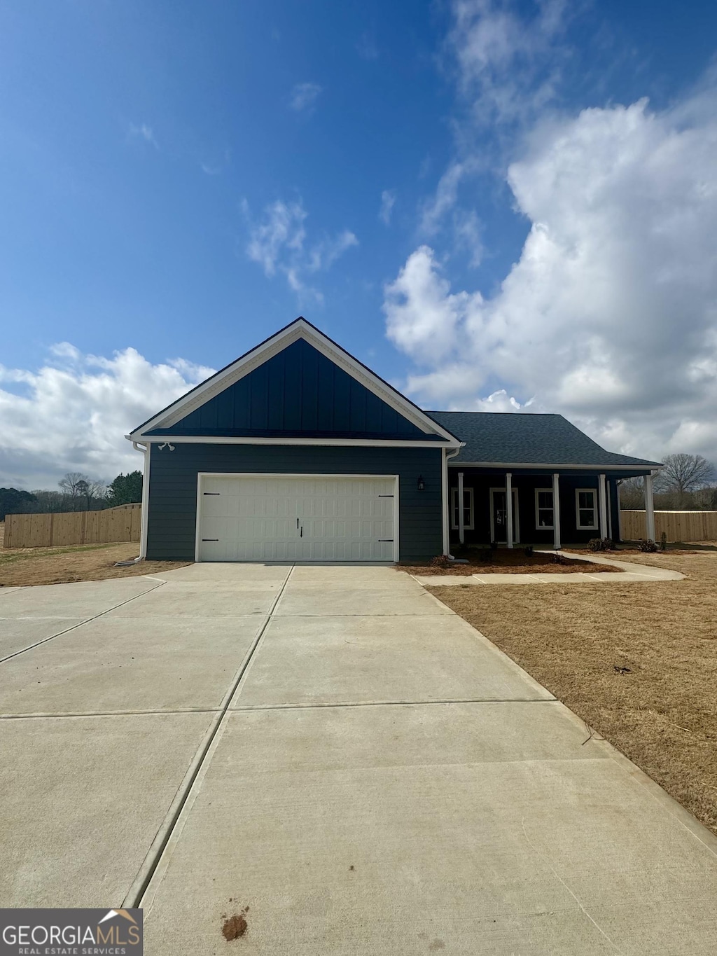 single story home with a garage