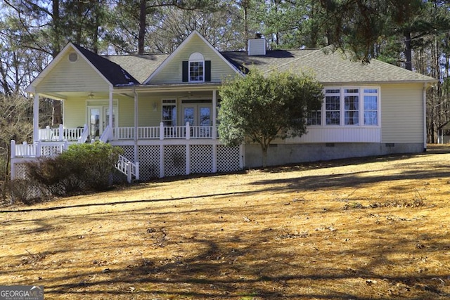 view of front of house featuring a porch and a front lawn