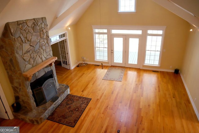 bonus room with vaulted ceiling and wood-type flooring