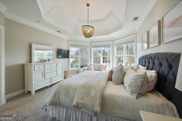 carpeted bedroom with an inviting chandelier, crown molding, and a raised ceiling