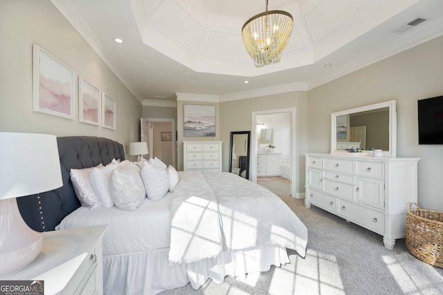 bedroom featuring an inviting chandelier, ensuite bath, ornamental molding, a raised ceiling, and light colored carpet