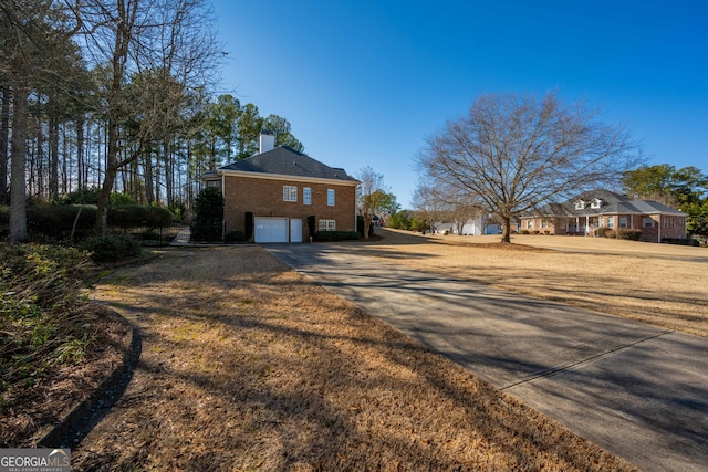 view of home's exterior featuring a garage