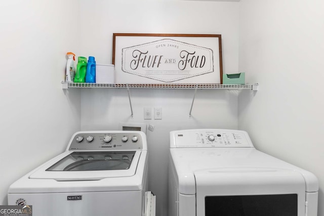 washroom featuring separate washer and dryer