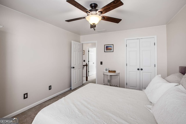 bedroom featuring carpet, ceiling fan, and a closet