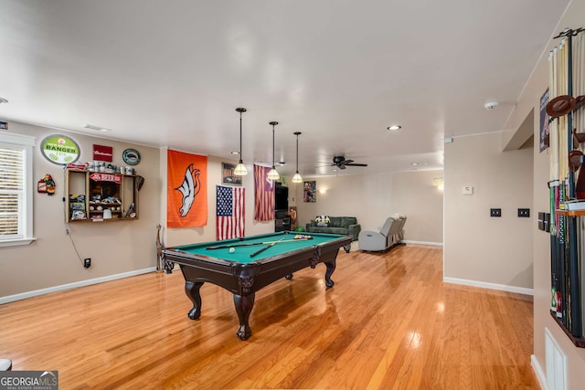 recreation room with hardwood / wood-style floors, pool table, and ceiling fan