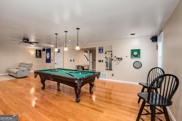 rec room with hardwood / wood-style flooring, pool table, and ceiling fan