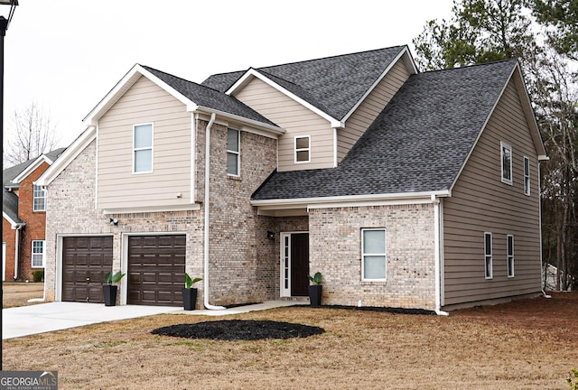 view of front of property with a garage