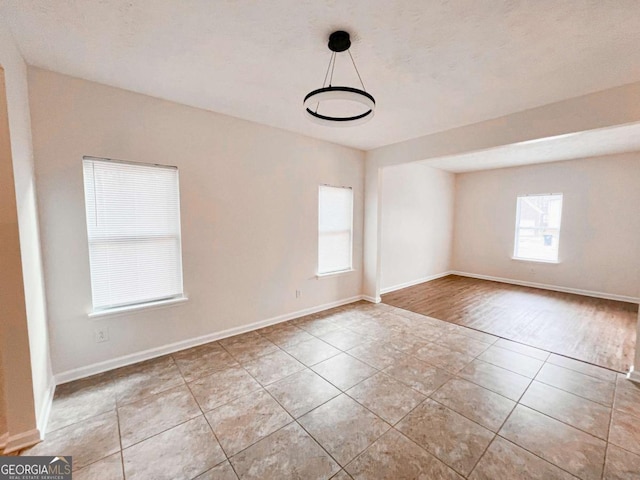 empty room featuring light tile patterned flooring