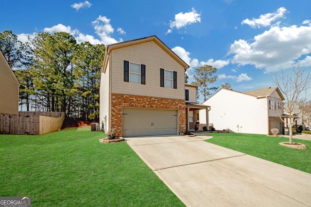 view of front of home featuring a garage and a front lawn