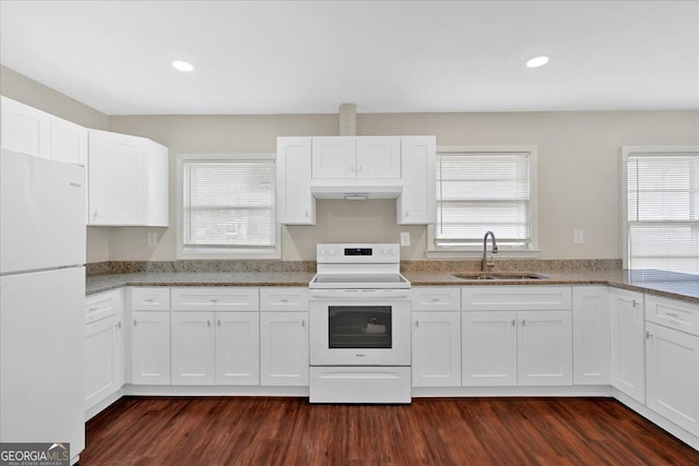 kitchen featuring light stone counters, white appliances, sink, and white cabinets