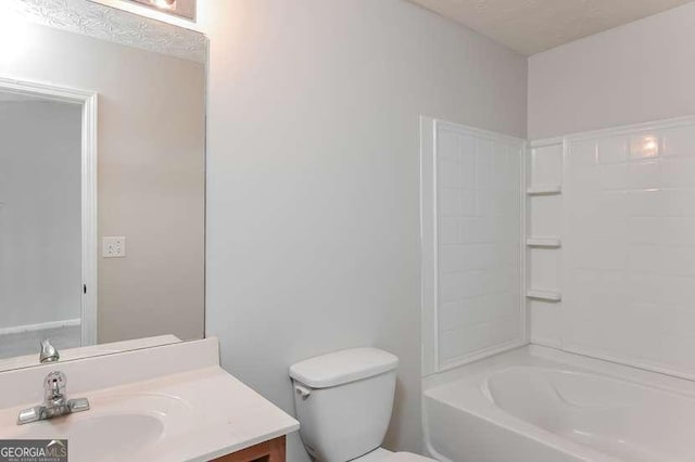 full bathroom featuring shower / tub combination, vanity, a textured ceiling, and toilet