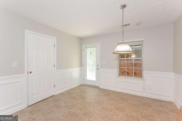 view of unfurnished dining area