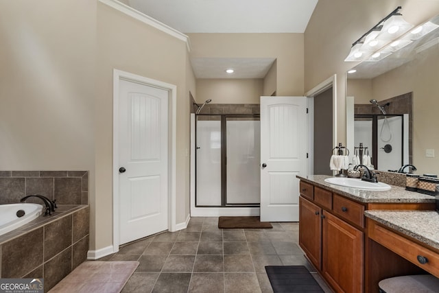 bathroom with vanity, plus walk in shower, and tile patterned flooring