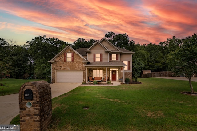 craftsman-style house with a garage, a lawn, and a porch