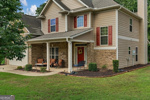 view of front of property featuring a patio area and a front yard