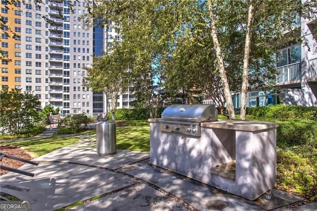 view of patio / terrace featuring grilling area and exterior kitchen