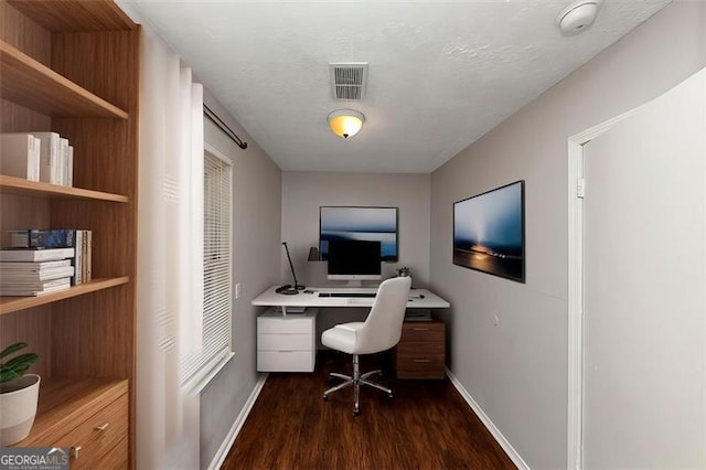 office with dark wood-type flooring