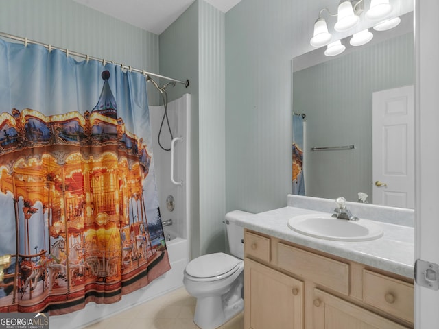 full bathroom featuring shower / bath combo, vanity, and toilet