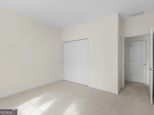 unfurnished bedroom featuring a closet