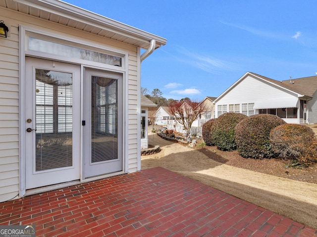 doorway to property with a patio area